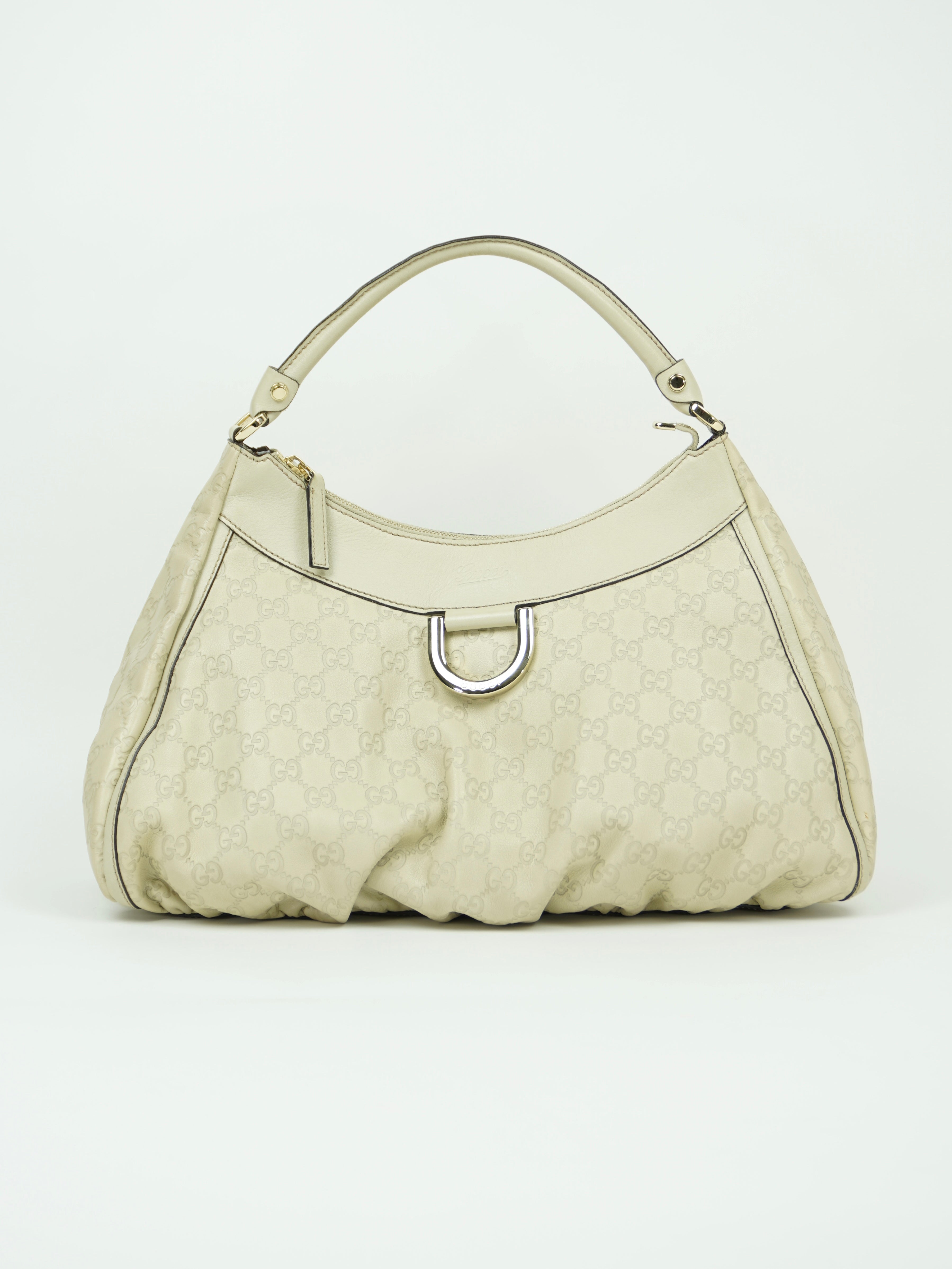 GUCCI LEATHER EMBOSSED MONOGRAM ABBEY BAG