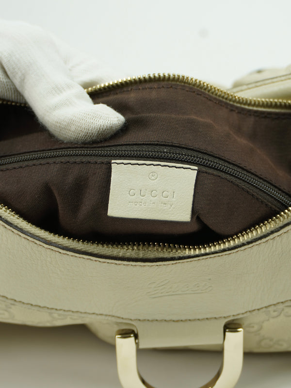 GUCCI LEATHER EMBOSSED MONOGRAM ABBEY BAG