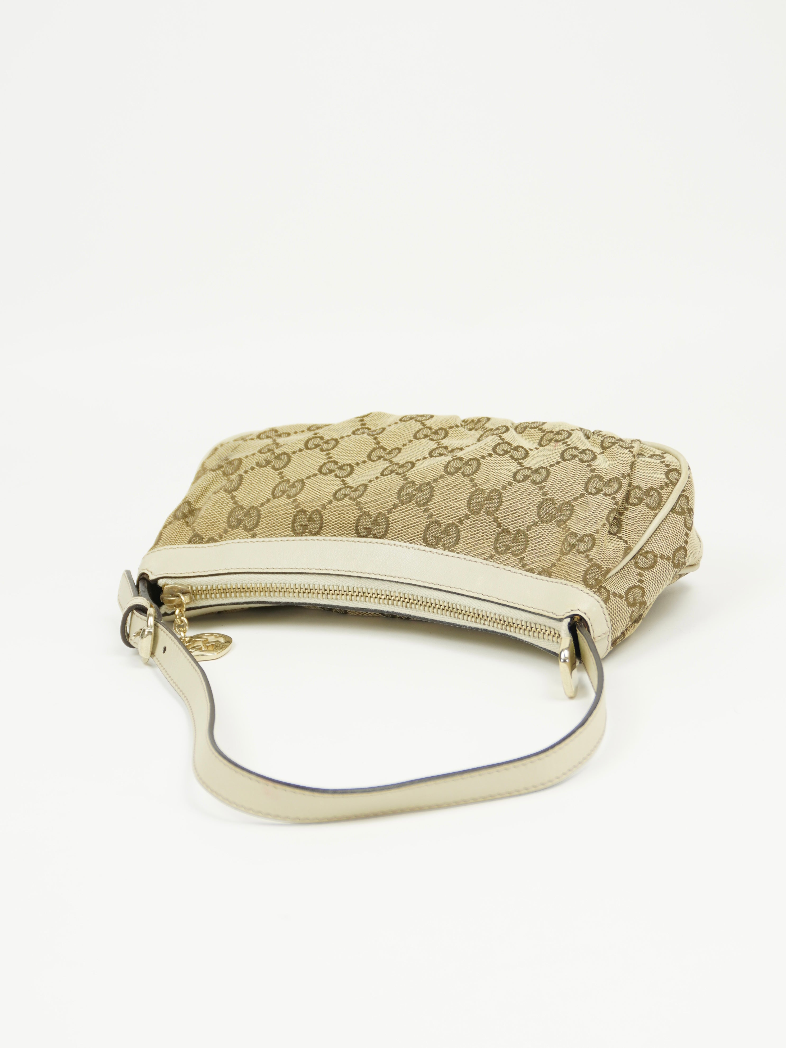 GUCCI MONOGRAM BAG WITH HEART CHARM