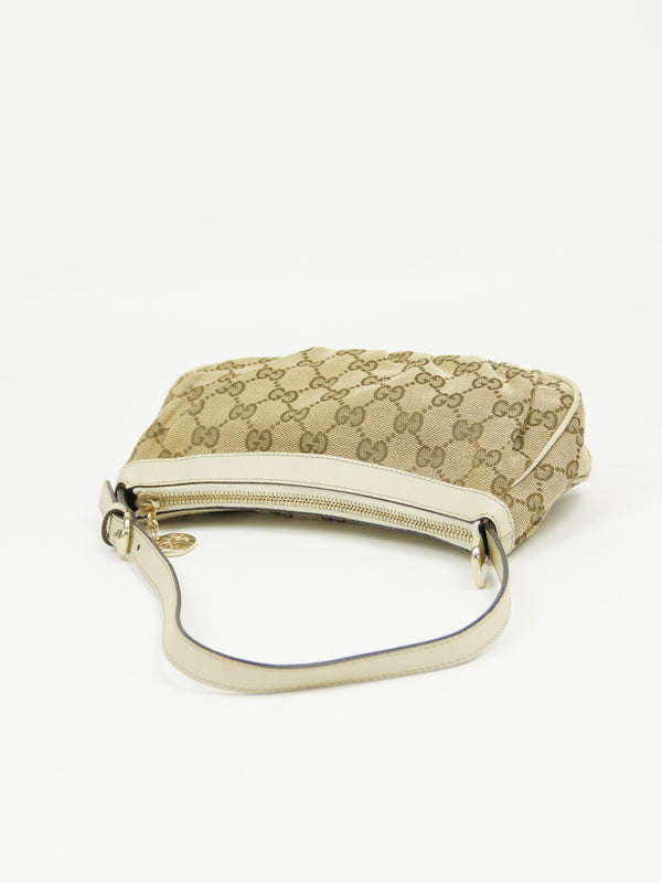 GUCCI MONOGRAM BAG WITH HEART CHARM