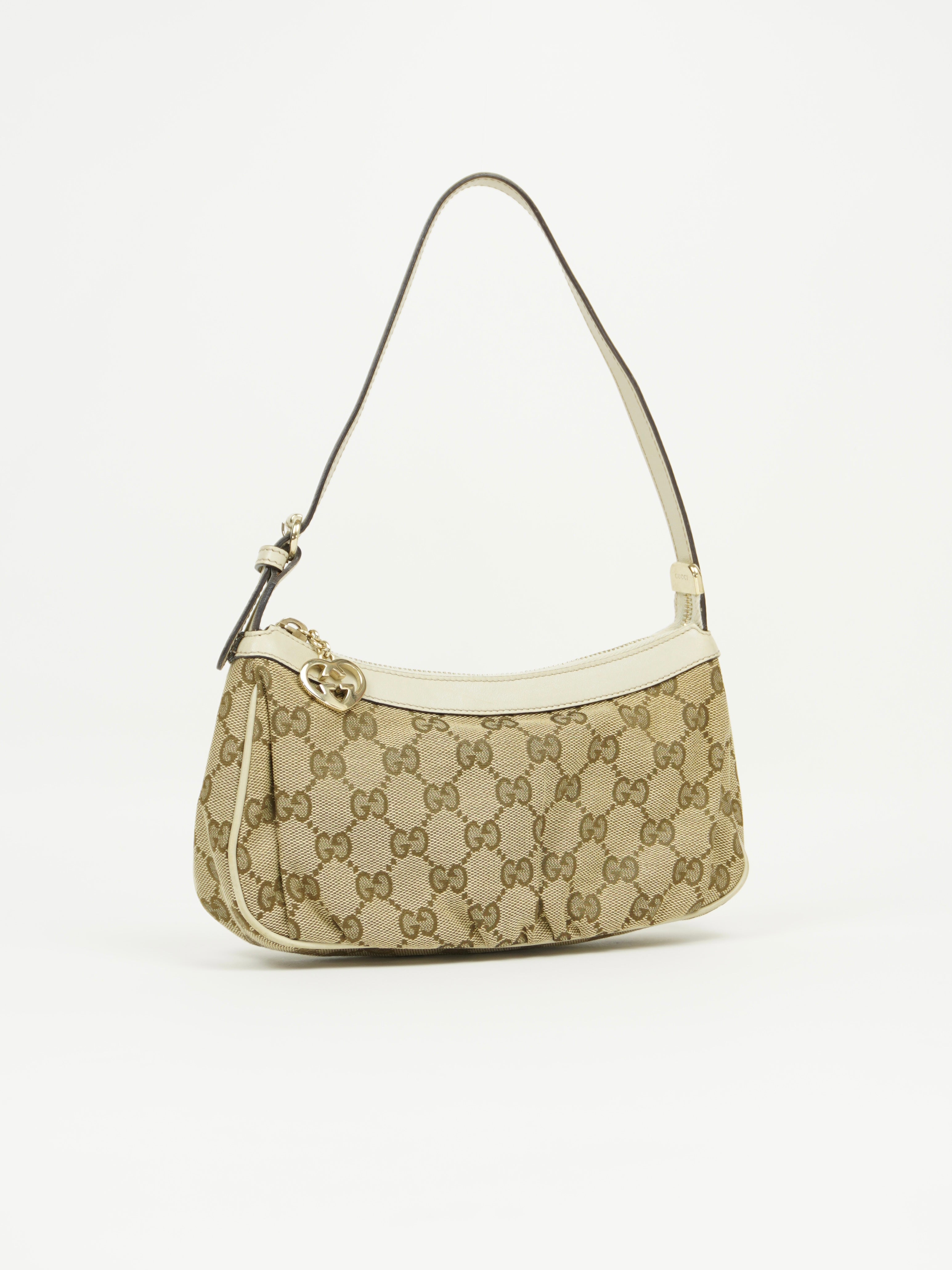 GUCCI MONOGRAM BAG WITH HEART CHARM