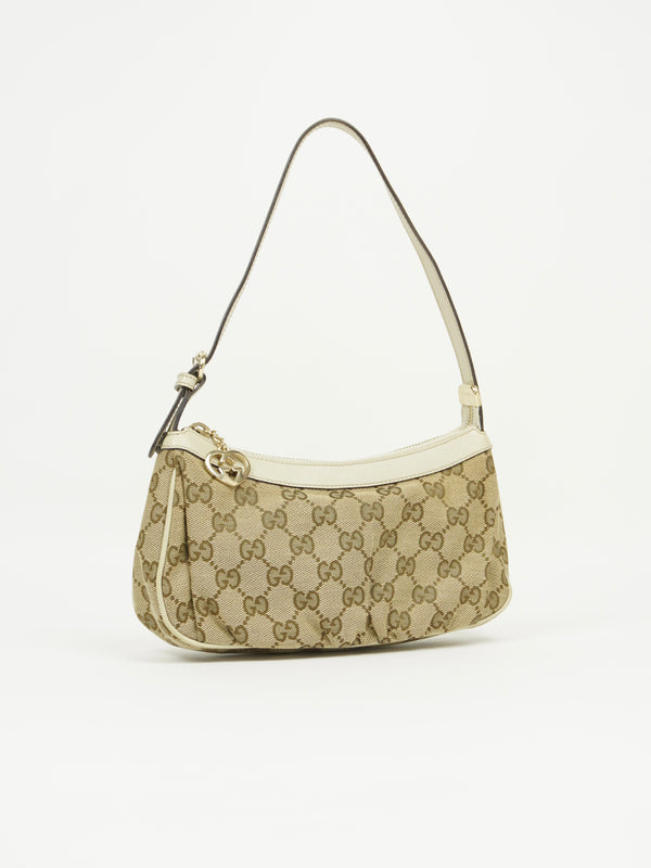 GUCCI MONOGRAM BAG WITH HEART CHARM
