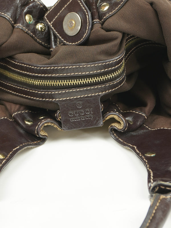 GUCCI MONOGRAM STUDDED PELHAM BAG