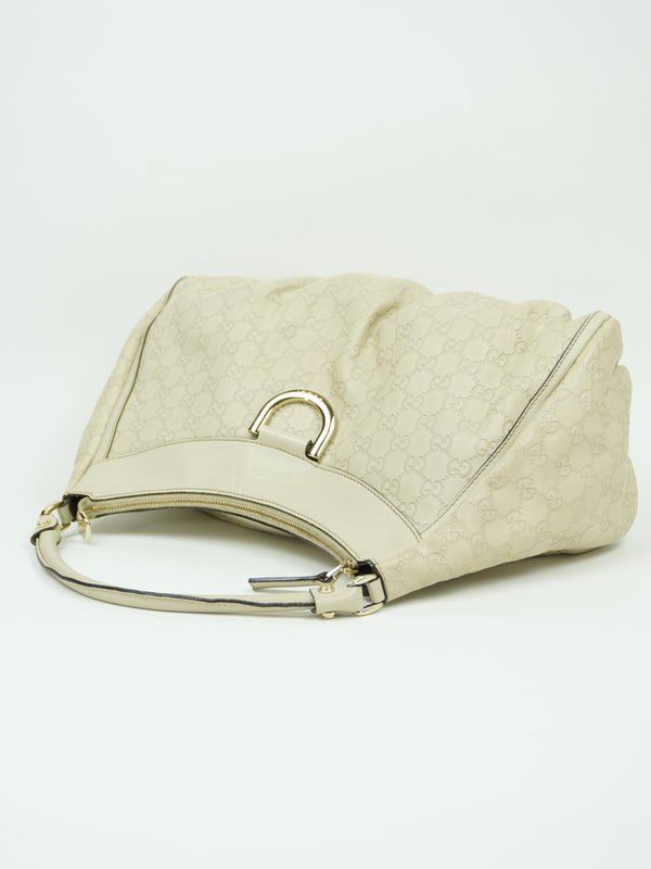 GUCCI LEATHER EMBOSSED MONOGRAM ABBEY BAG