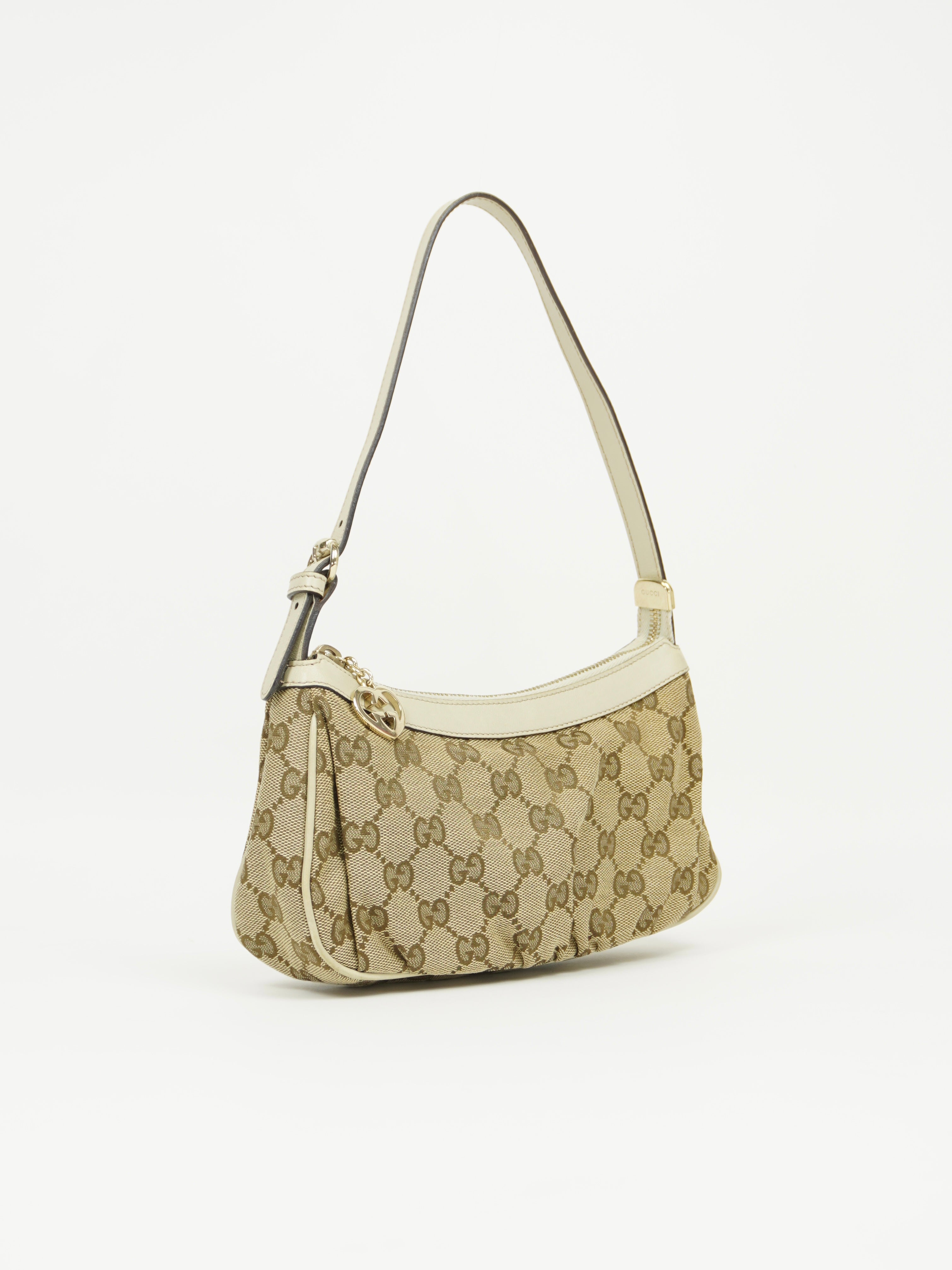 GUCCI MONOGRAM BAG WITH HEART CHARM