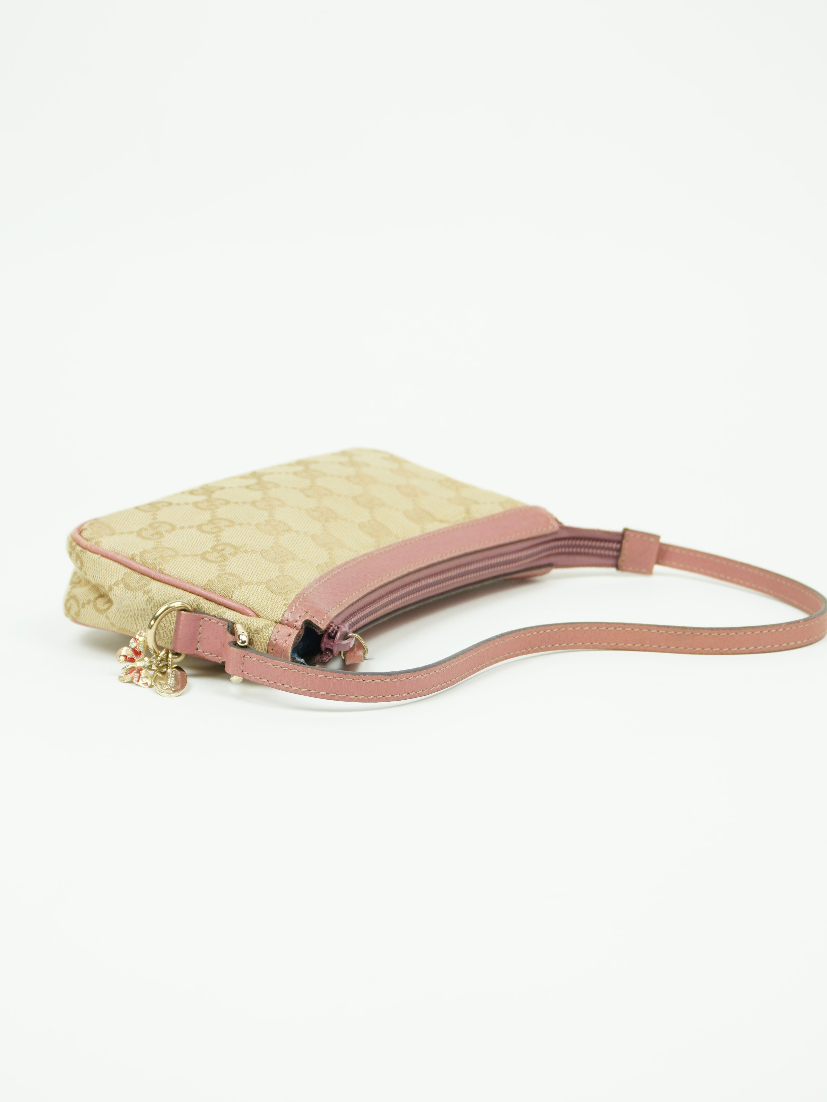 GUCCI MONOGRAM BAG WITH CHARM
