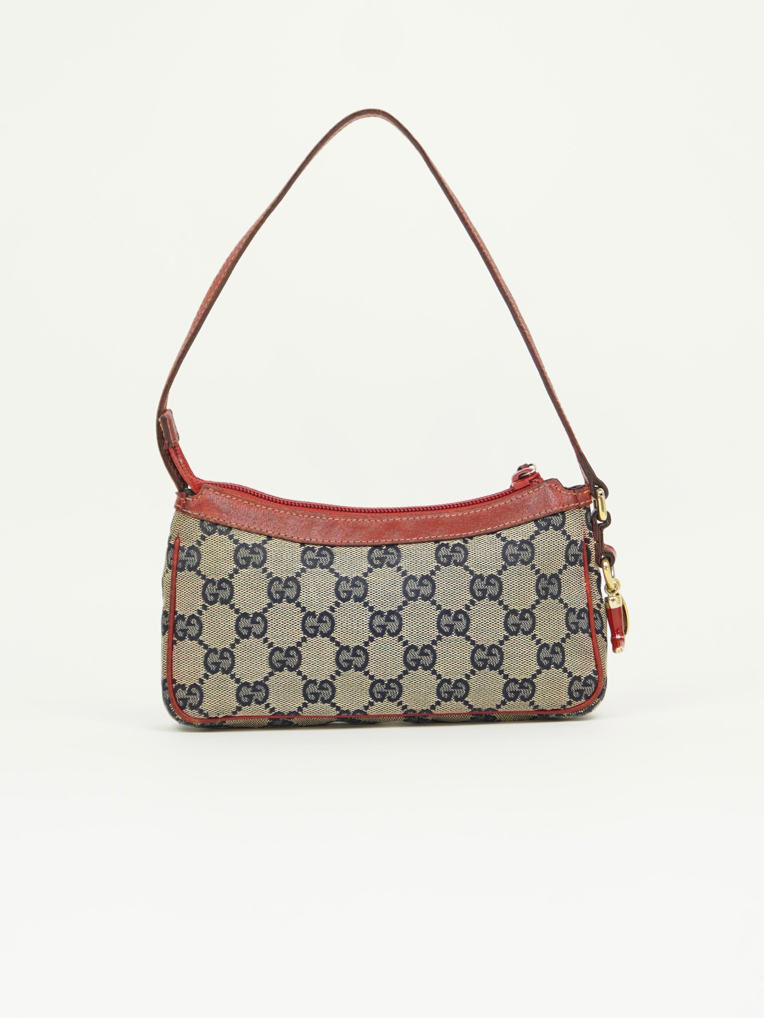 GUCCI MONOGRAM BOOT CHARM BAG