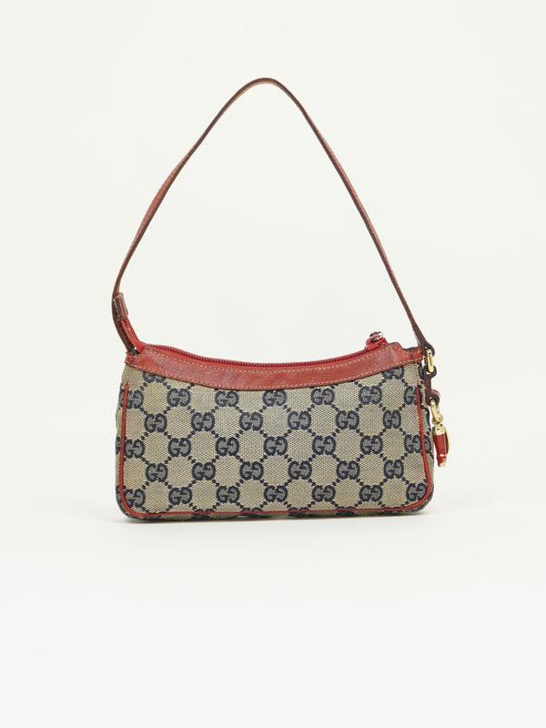 GUCCI MONOGRAM BOOT CHARM BAG