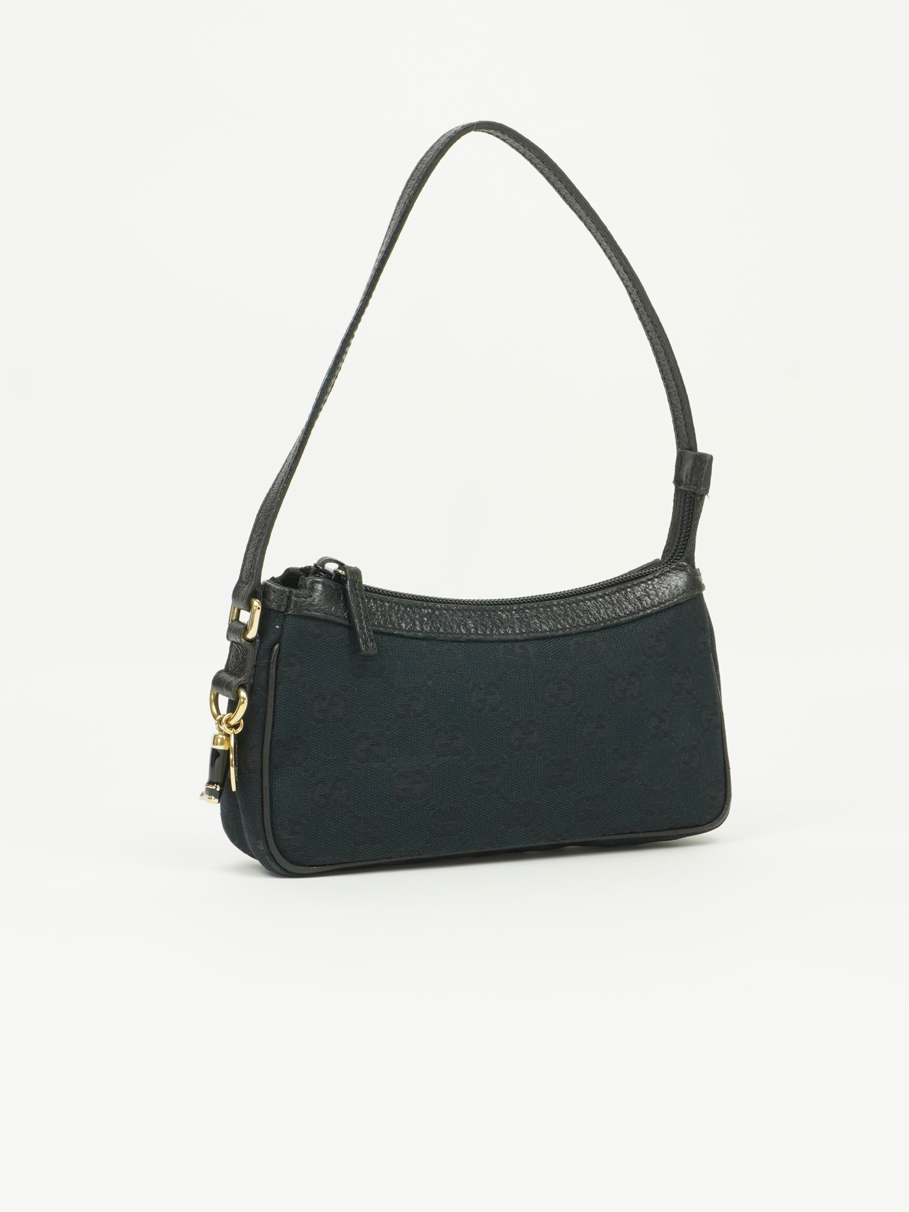 GUCCI MONOGRAM BOOT CHARM BAG