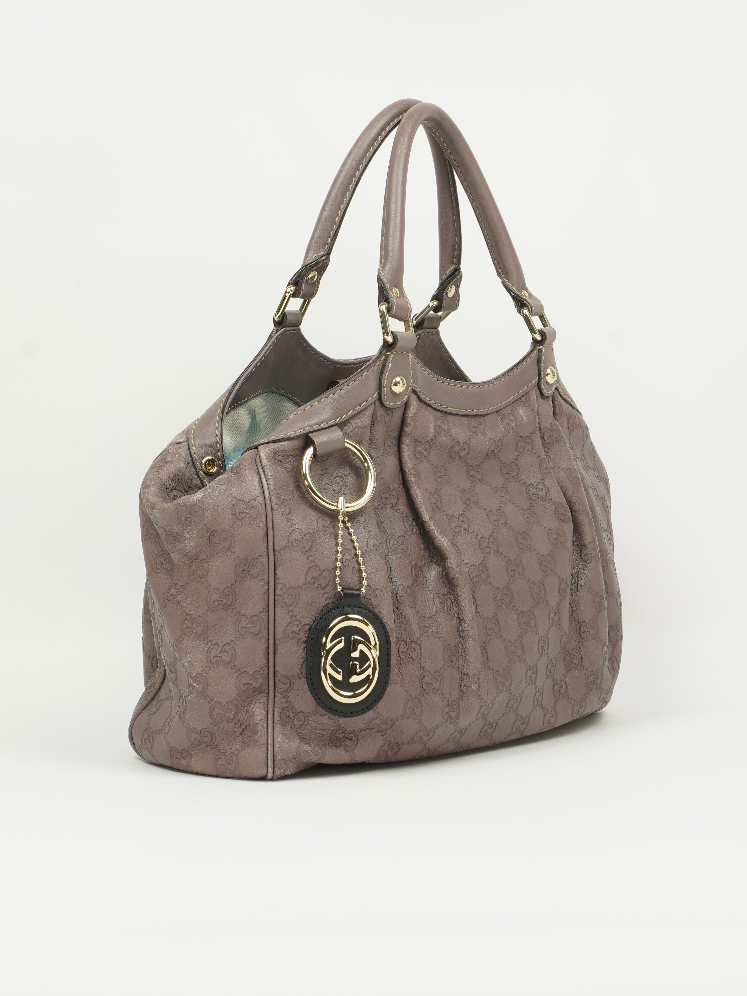 GUCCI MONOGRAM LEATHER SUKEY BAG