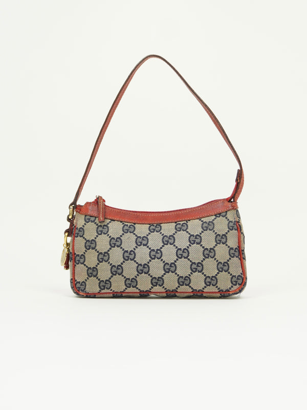 GUCCI MONOGRAM BOOT CHARM BAG
