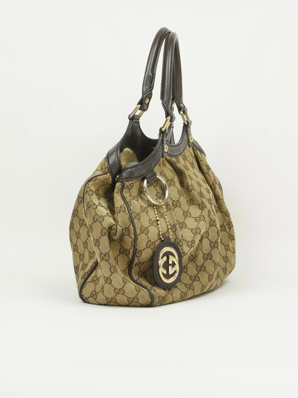 GUCCI MONOGRAM SUKEY BAG