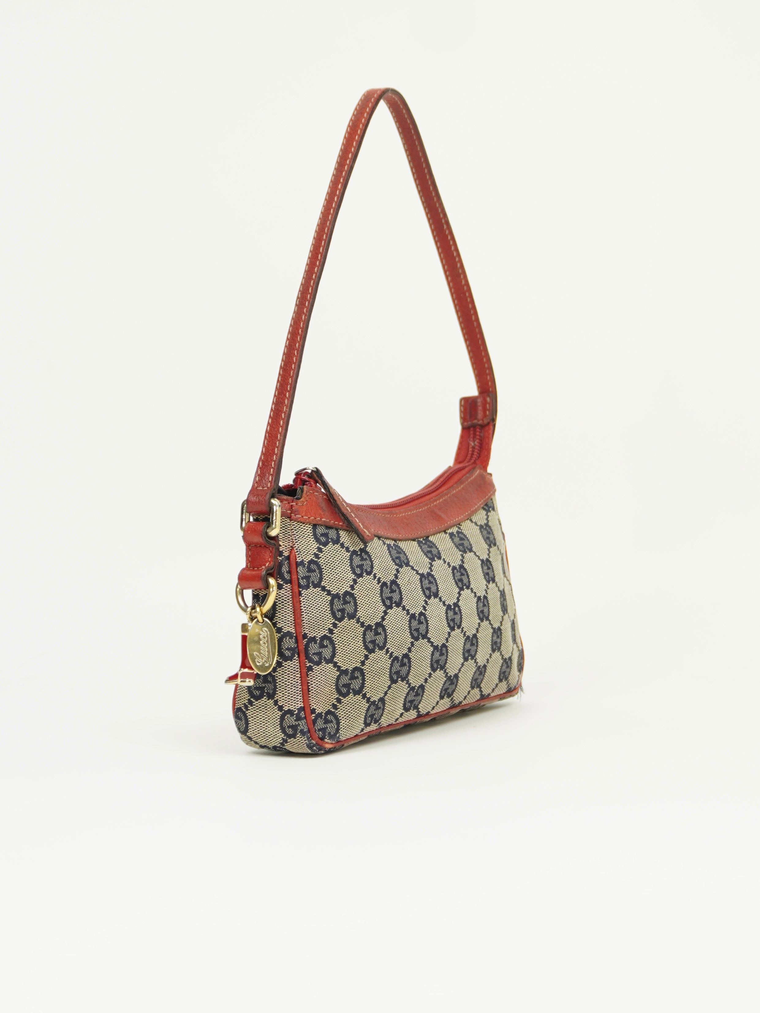 GUCCI MONOGRAM BOOT CHARM BAG