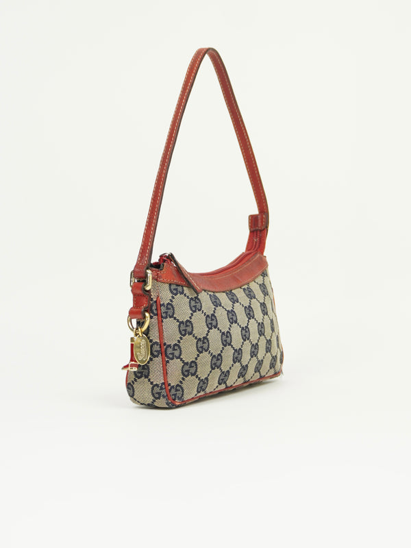 GUCCI MONOGRAM BOOT CHARM BAG