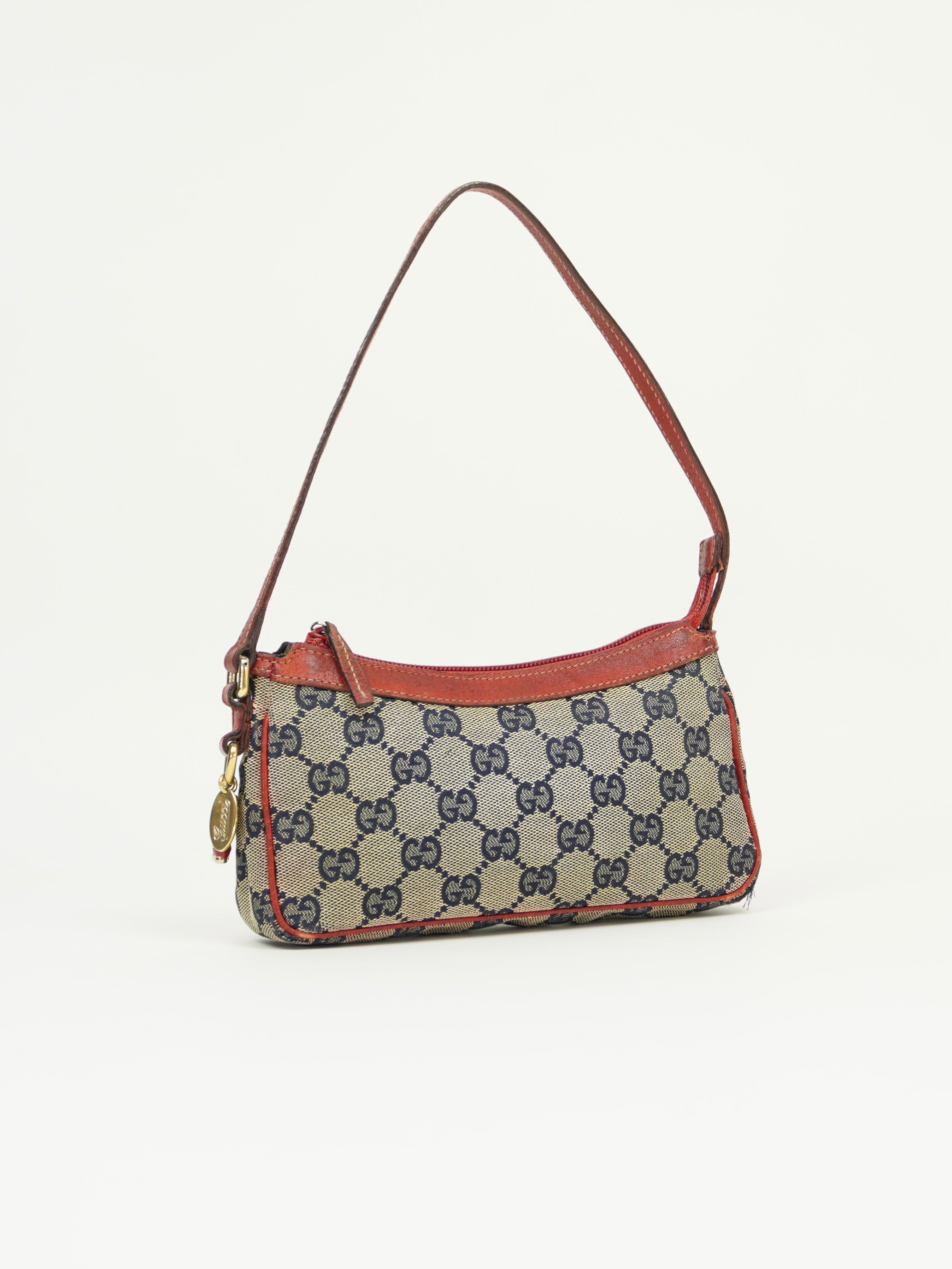 GUCCI MONOGRAM BOOT CHARM BAG