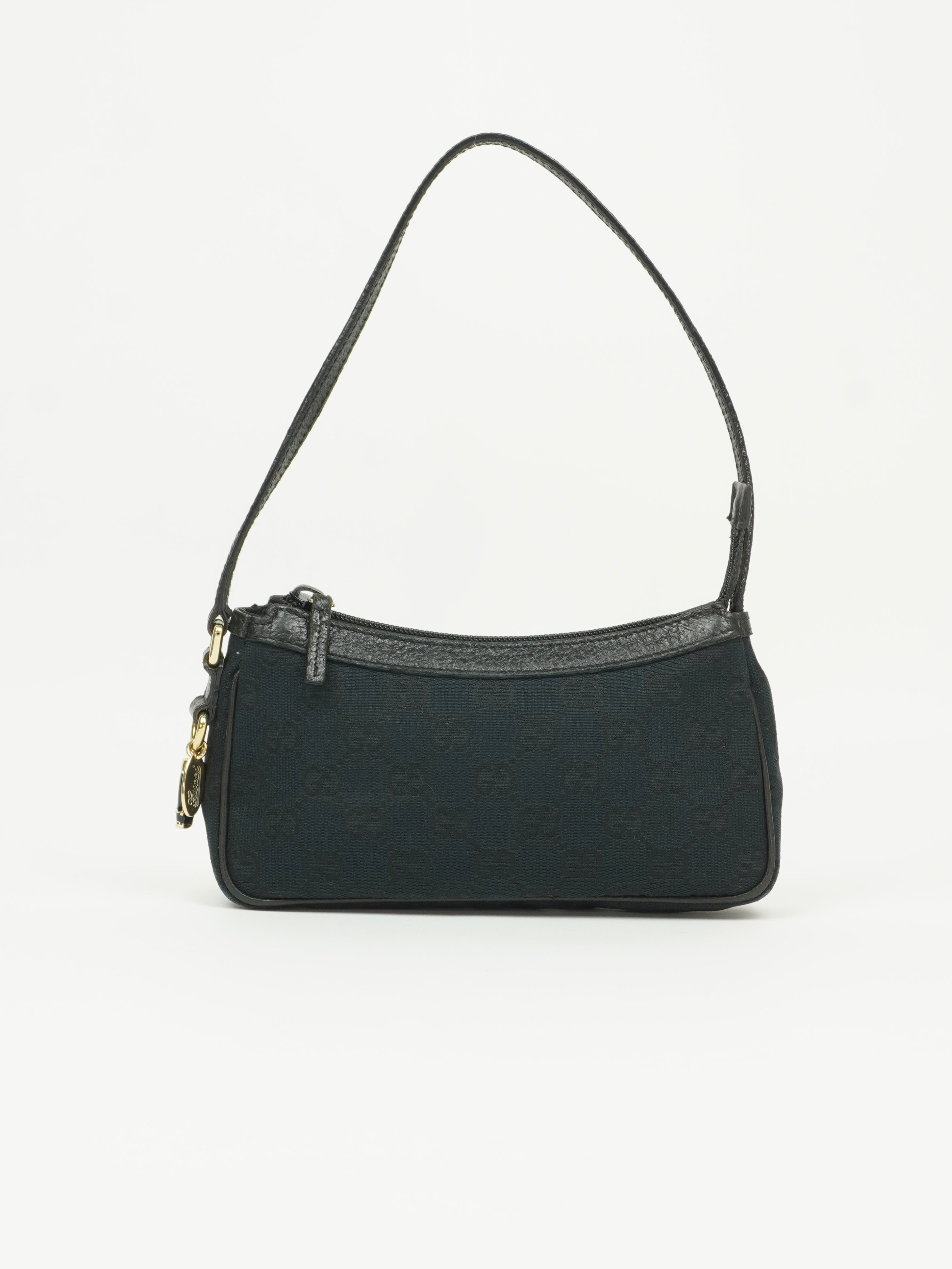 GUCCI MONOGRAM BOOT CHARM BAG