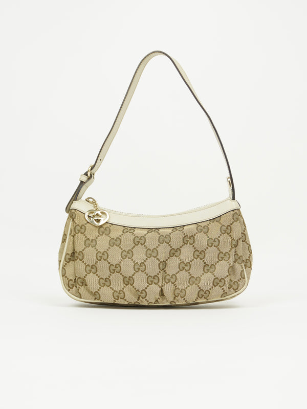 GUCCI MONOGRAM BAG WITH HEART CHARM