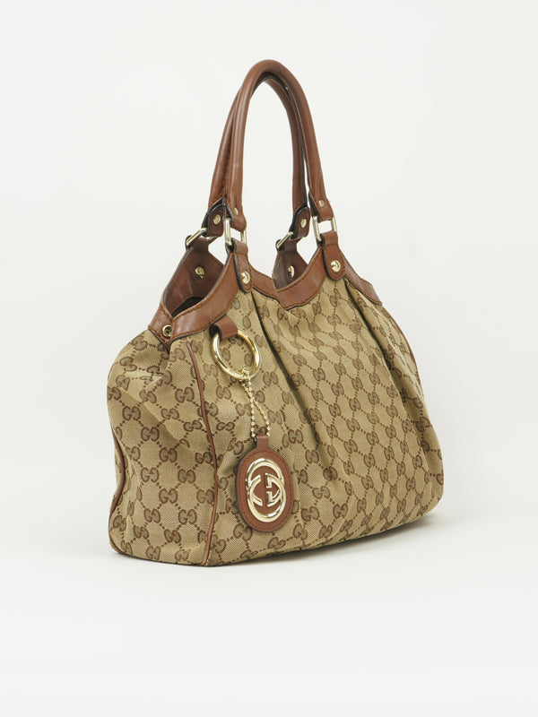 GUCCI MONOGRAM SUKEY BAG
