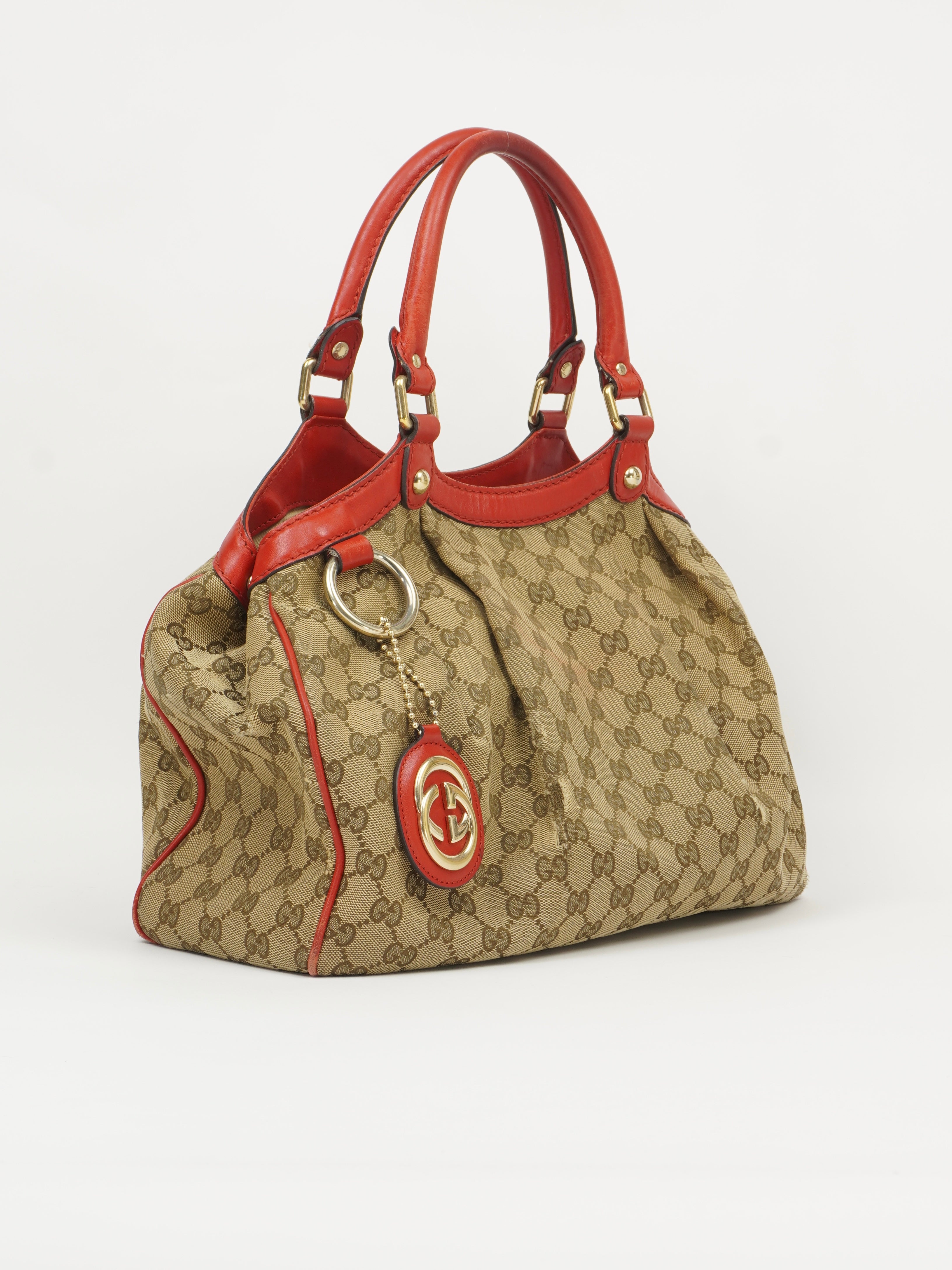 GUCCI MONOGRAM SUKEY BAG